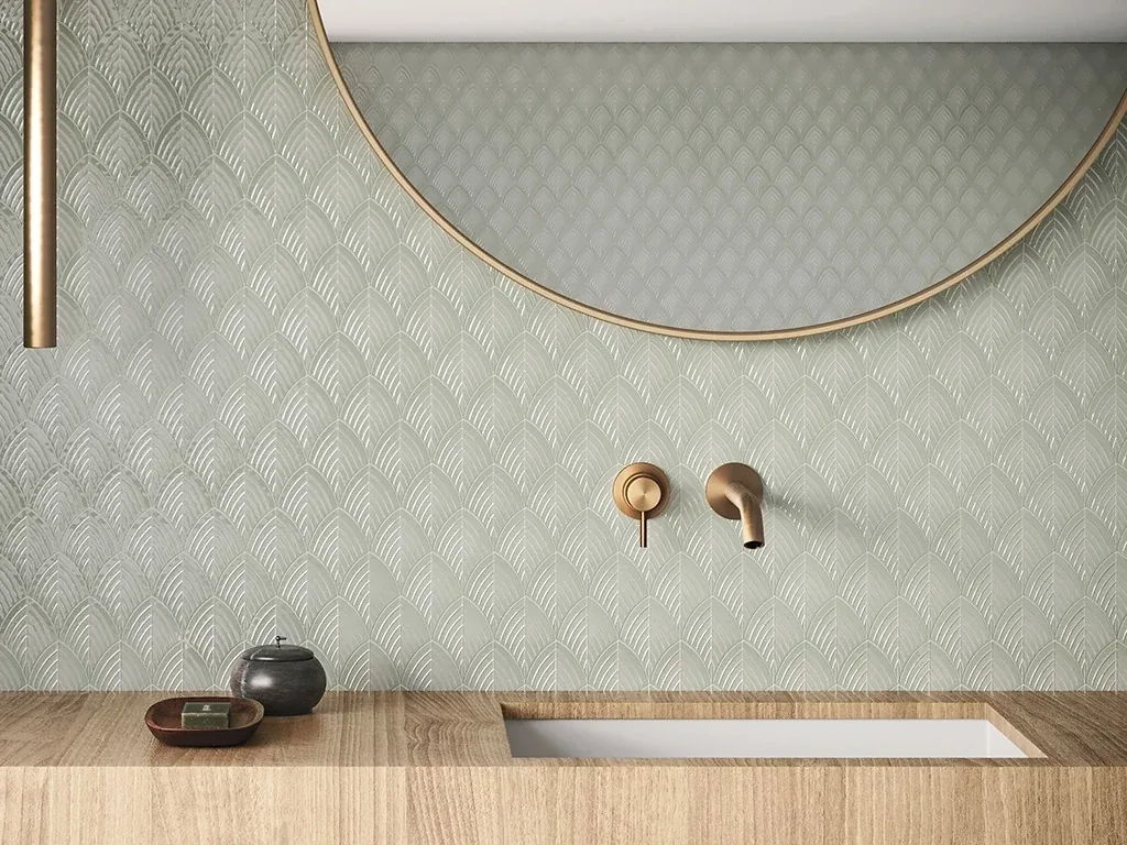 Textured decorative tile above a warm wood bathroom vanity