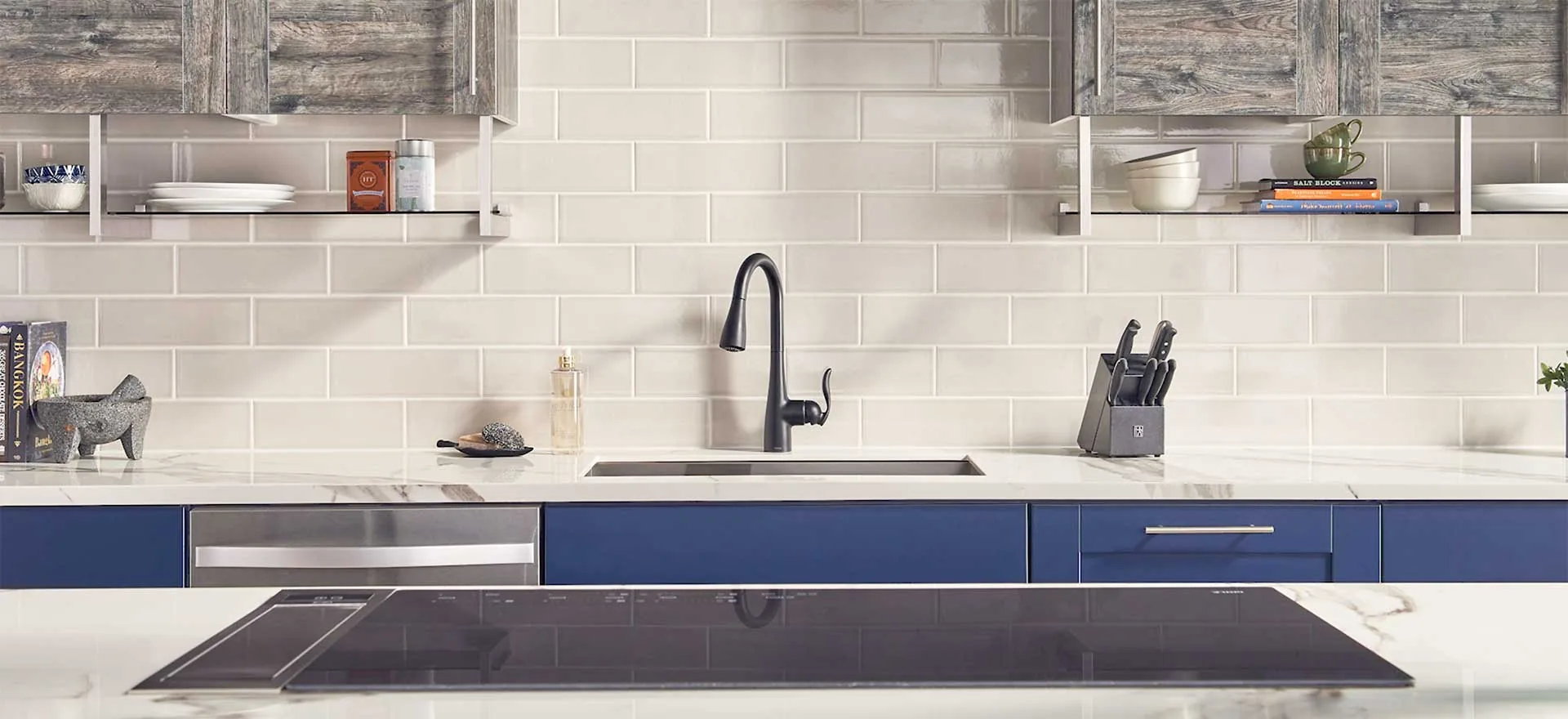 Coordinated kitchen countertop and light tile backsplash