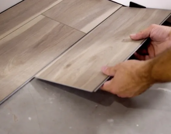 Luxury vinyl planks being fitted during installation